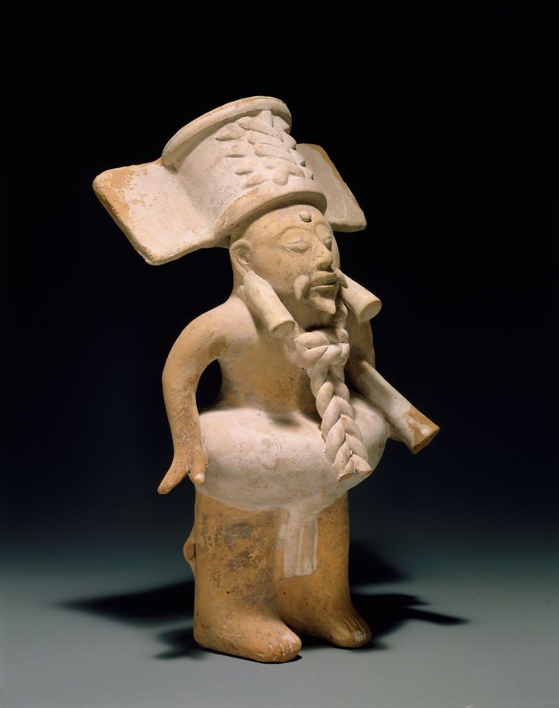 Ball Player, Unknown Nopiloa Artist, 7th-10th century. Image c/o the Met. A sculpture of a Mesoamerican ball player.