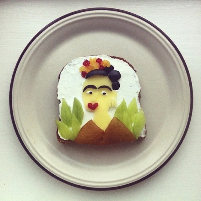 Ida Skivenes recreates famous art pieces on toast. Look--it's Frida Kahlo! Image c/o Hyperallergic and Ida Skivenes.